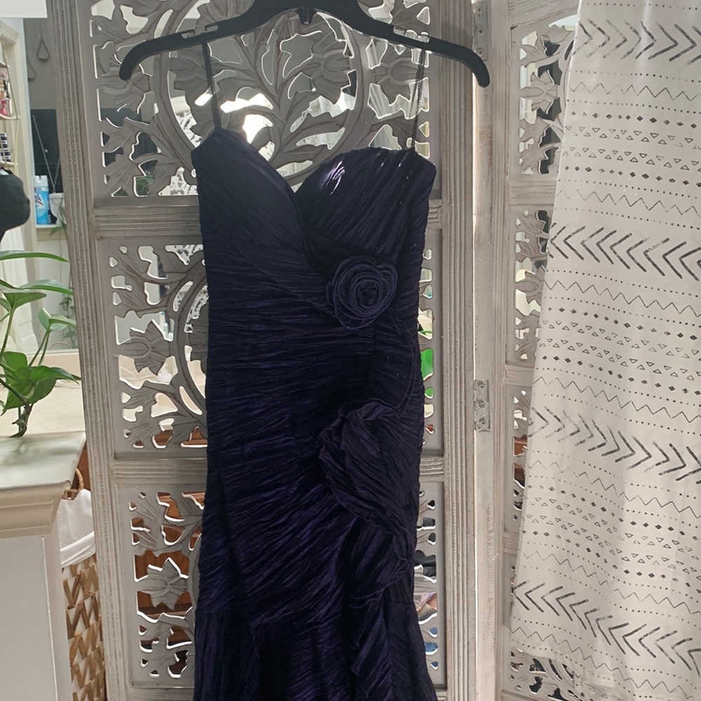 Sweetheart Strapless Deep Purple with a zipper back with small train. Size 7/8